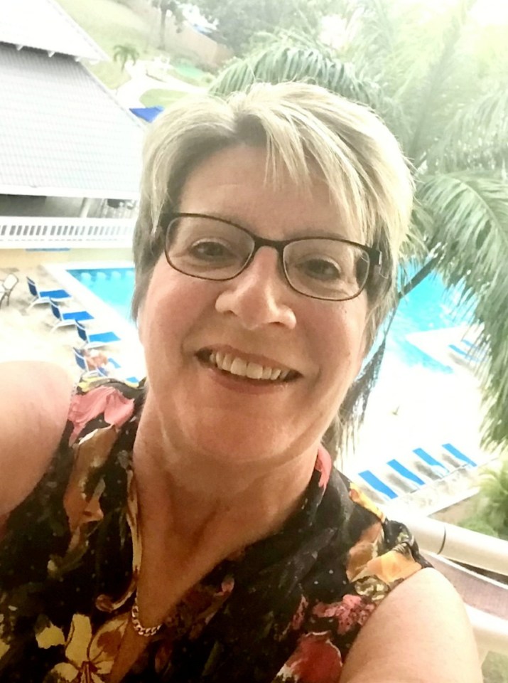 Selfie of Debbie Wearing, a stalking victim, overlooking a swimming pool.