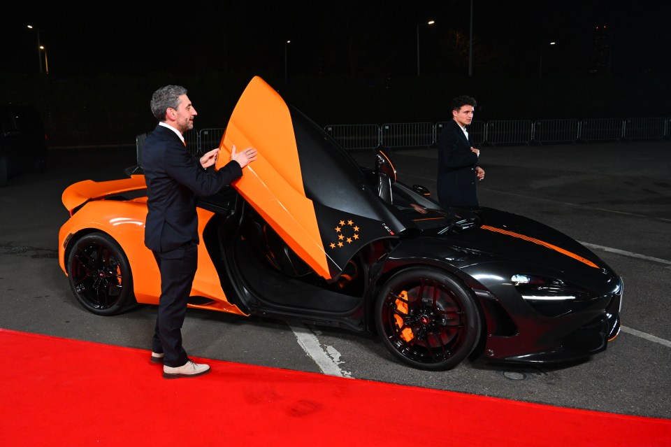 Andrea Stella, McLaren Team Principal, and Lando Norris in a McLaren 750S.