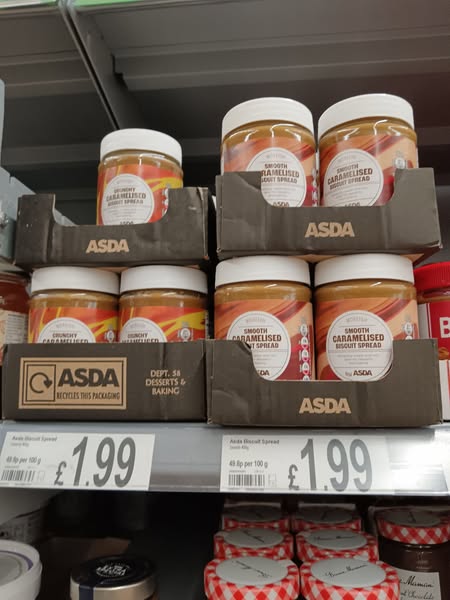 ASDA caramelised biscuit spread jars on a shelf.