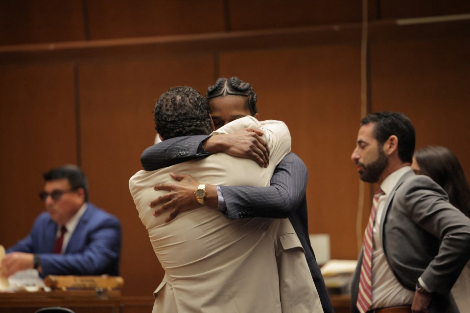 A$AP Rocky embracing his attorney after a court verdict.