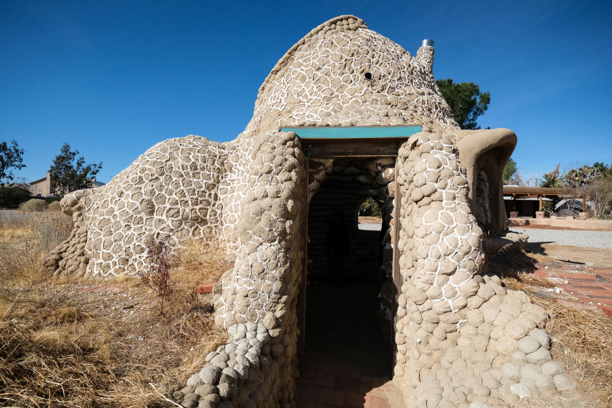 One of the buildings at CalEarth used to test design ideas.