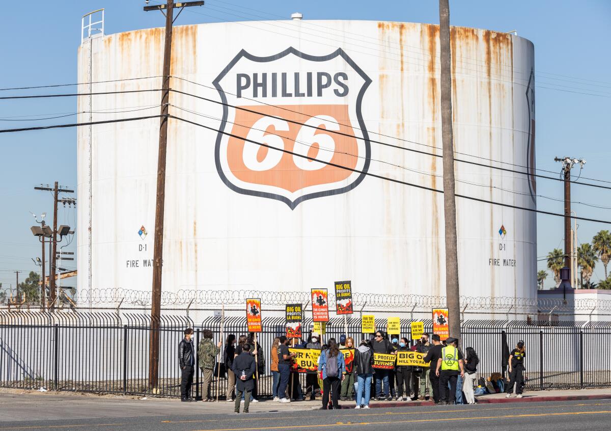 Sunrise Movement LA protesters demonstrate at a Phillips 66 facility in Carson on Jan. 16.