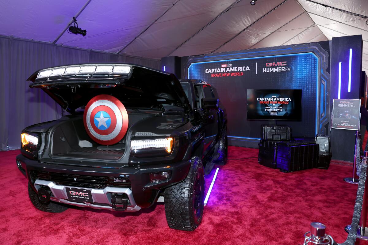 Captain America's shield is displayed in the front trunk of a GMC Hummer electric SUV at the premiere of "Brave New World."