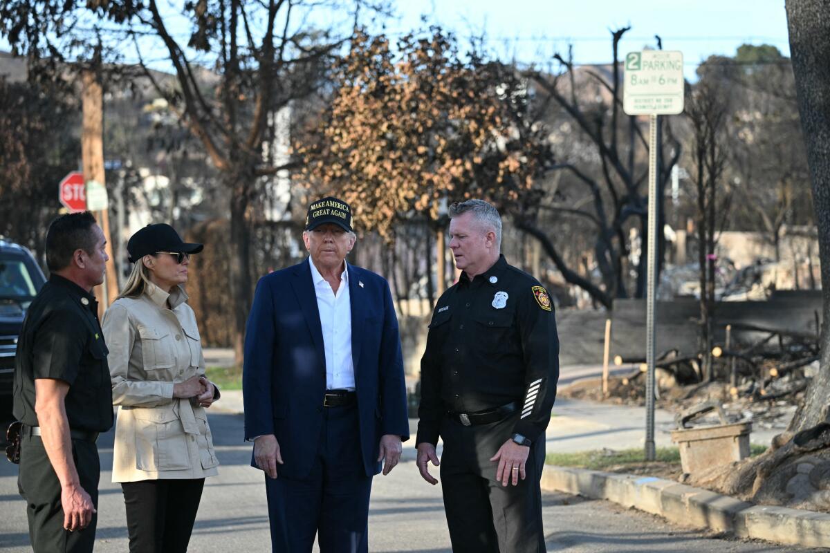 President Trump and First Lady Melania Trump tour an area of Pacific Palisades where homes were destroyed by January’s fire.