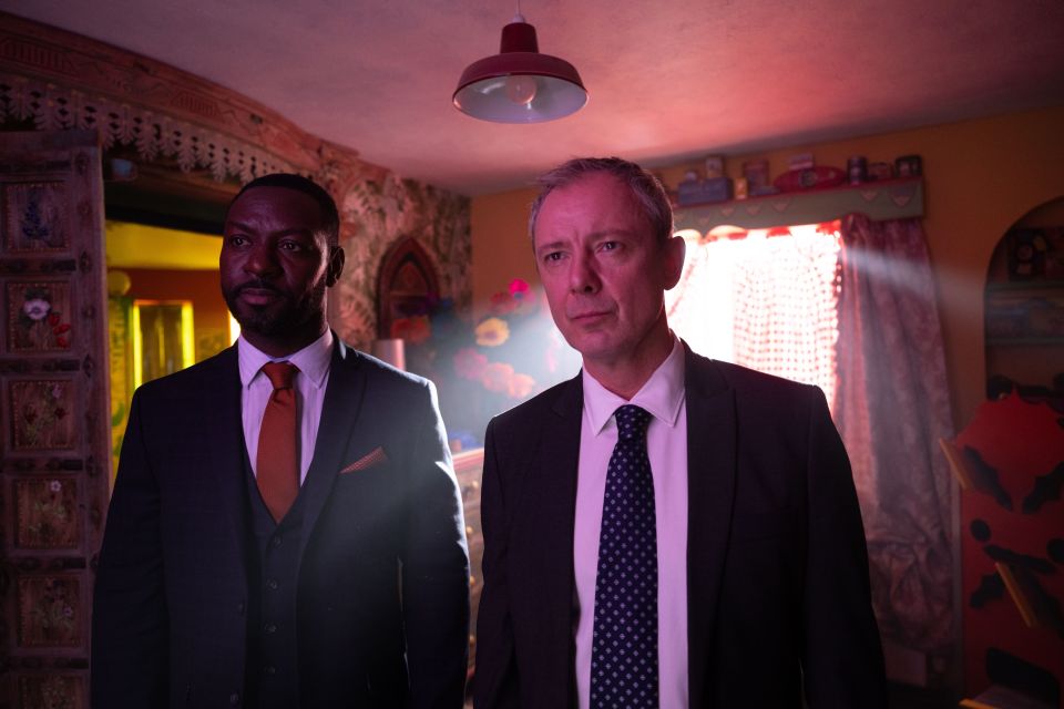 John Simm and Richie Campbell in a scene from the TV show *Grace*.