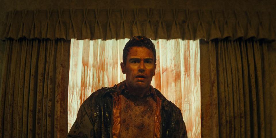 Theo James in a bloody scene from the film *The Monkey*.