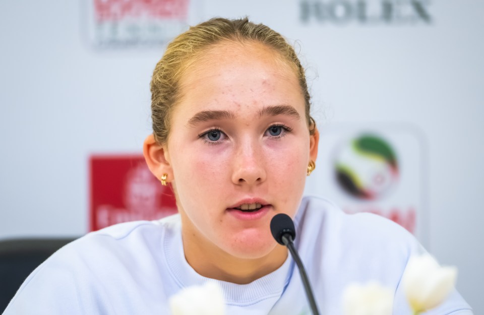 Mirra Andreeva speaking at a press conference.