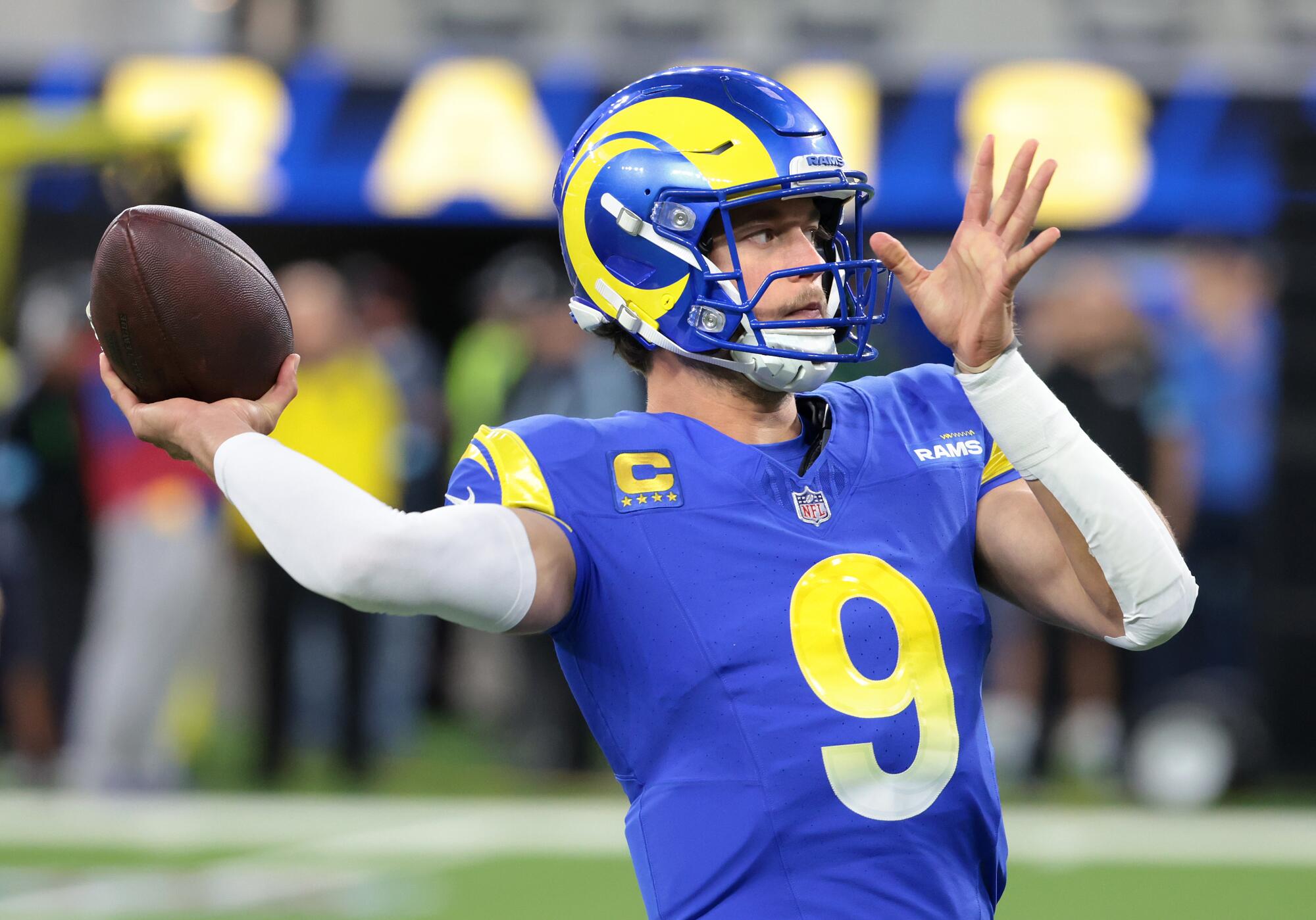 Rams quarterback Matthew Stafford warms up before a game against the Philadelphia Eagles.