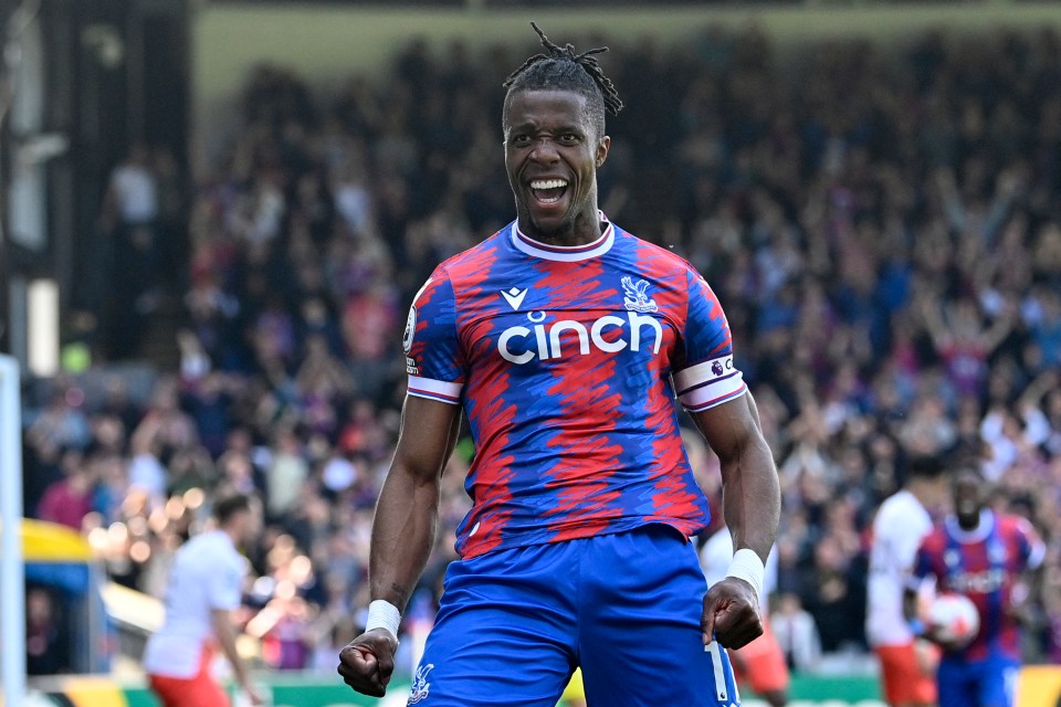 Wilfried Zaha celebrating a goal for Crystal Palace.