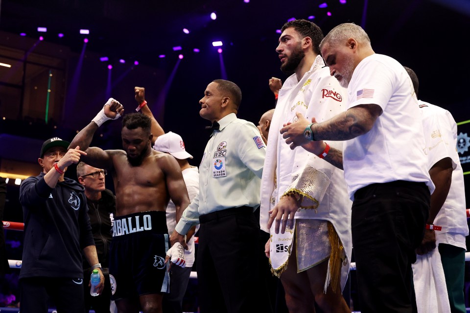 Carlos Adames celebrates his victory in a boxing match.