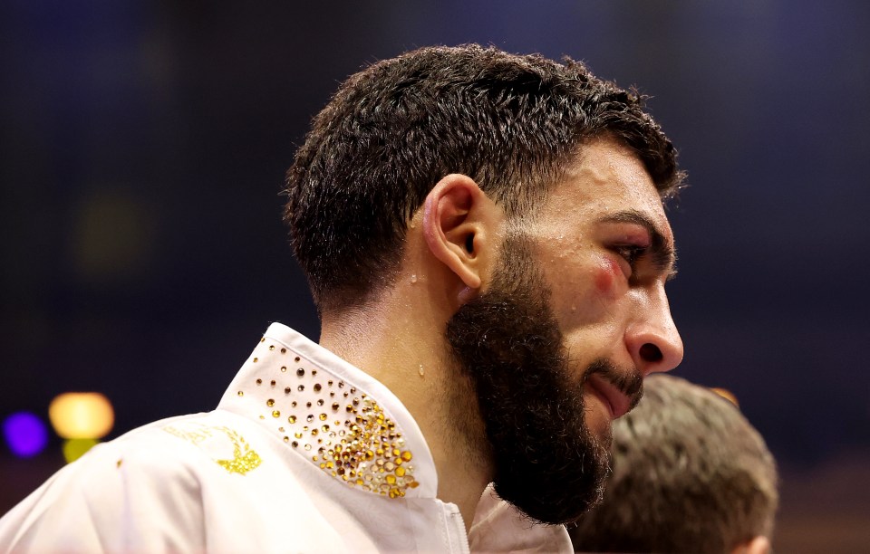 Hamzah Sheeraz reacting to defeat in a boxing match.