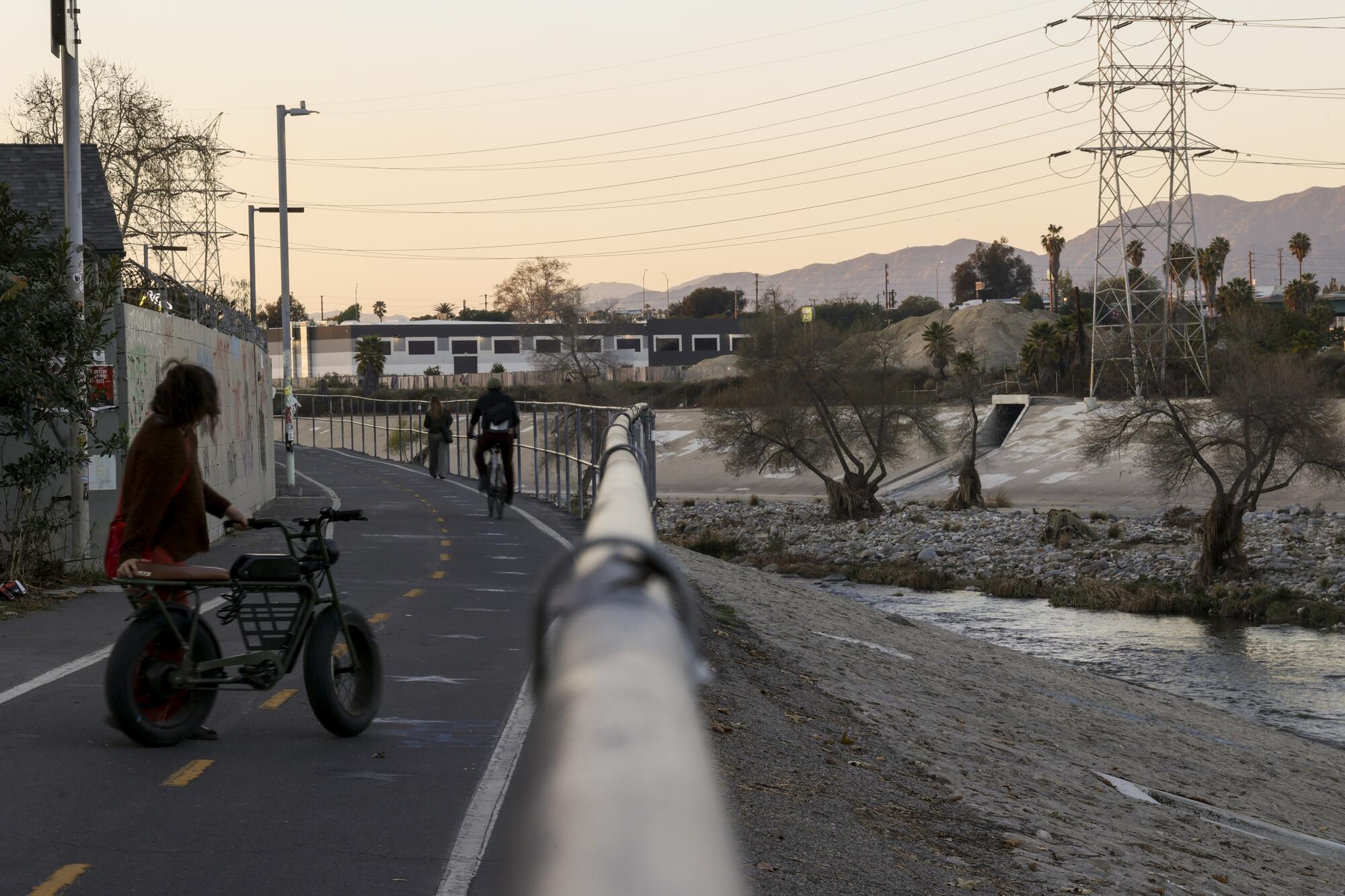 Pedestrians use the Los Angeles River Bikeway.