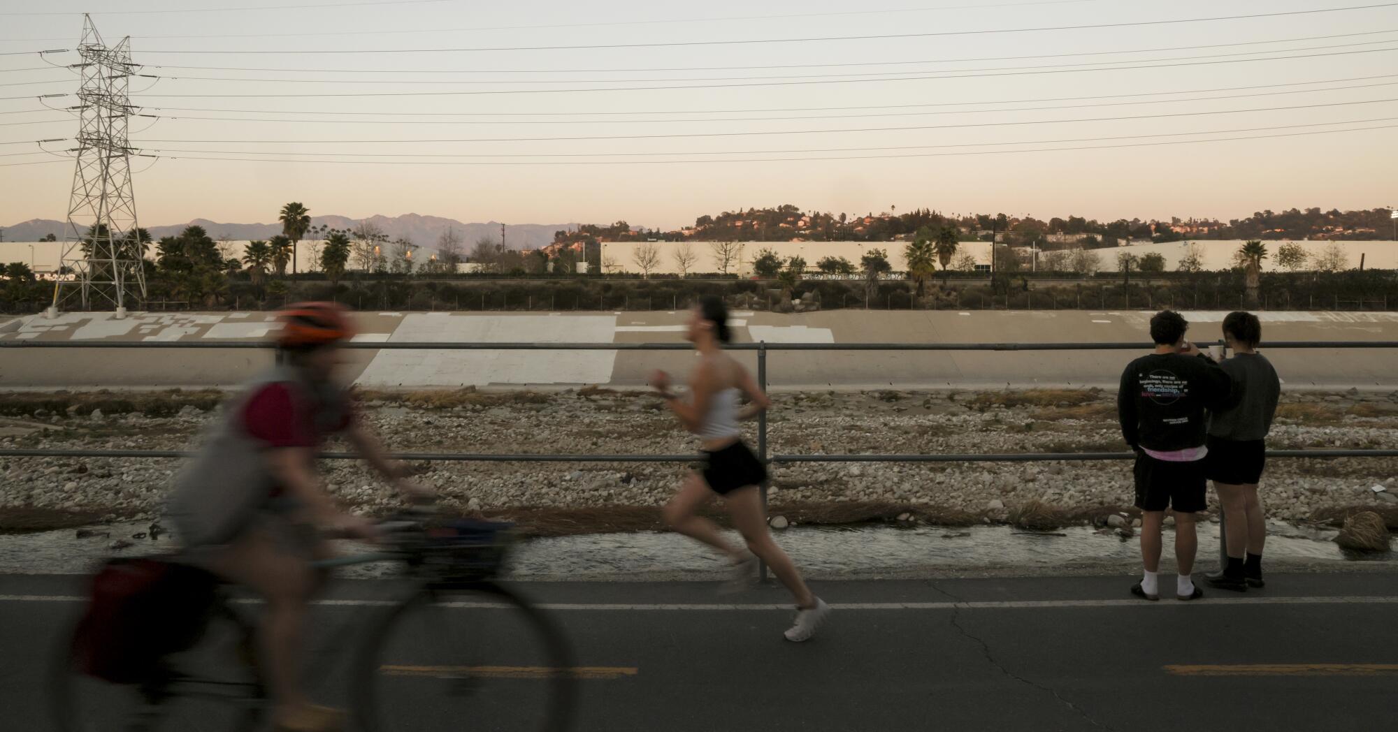 Pedestrians use the Los Angeles River Bikeway.