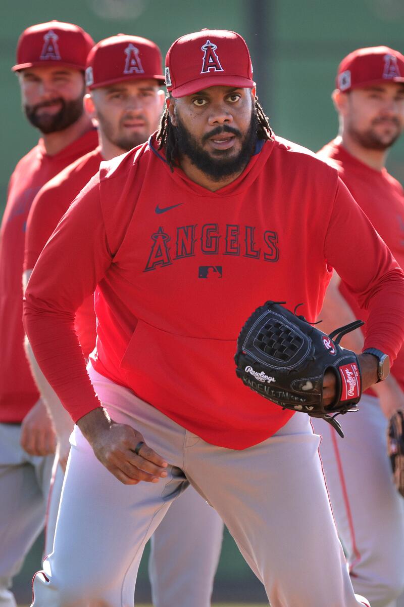 Angels relievers Kenley Jansen, left, and Ben Joyce take part in drills at spring training.