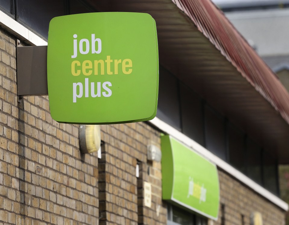 Job Centre Plus sign on brick building.