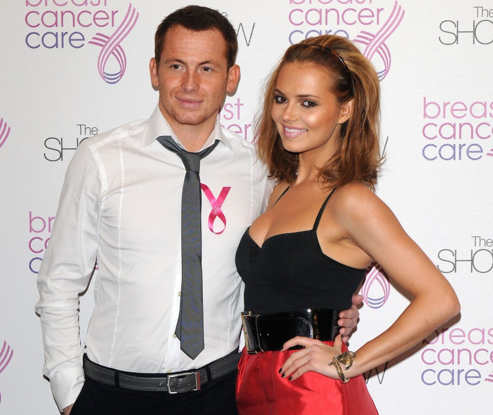 Photo of a man and woman at a Breast Cancer Care fashion show.