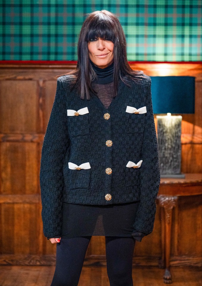 Claudia Winkleman in a black jacket.