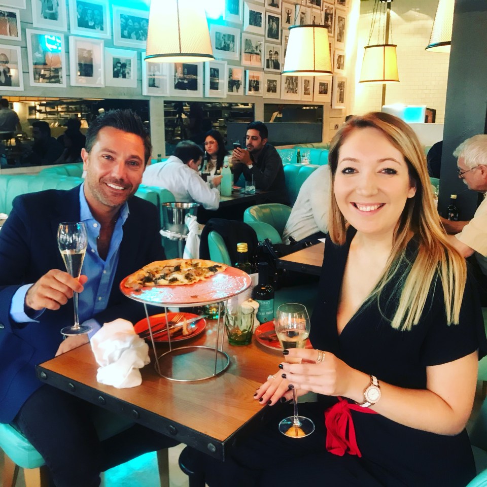 Amanda Devlin and Gino D'Acampo enjoying pizza and champagne.