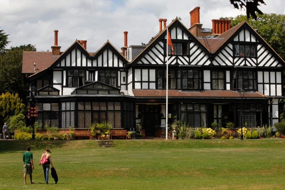 Bhaktivedanta Manor, a large black and white Tudor-style house.