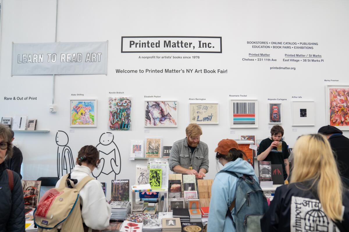 People at a pop-up art book fair