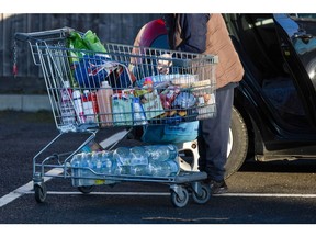 A customer outside a supermarket in Benfleet. Photographer: Chris Ratcliffe/Bloomberg