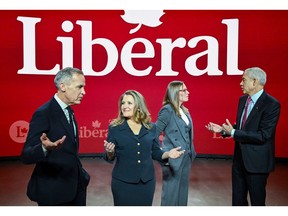 Mark Carney, from left, Chrystia Freeland, Karina Gould, and Frank Baylis. Photographer: Graham Hughes/Bloomberg