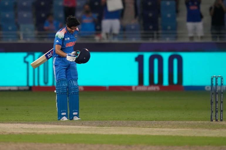 India's Shubman Gill celebrates after scoring a century during the ICC Champions Trophy cricket match between India and Bangladesh at Dubai International Cricket Stadium in Dubai, United Arab Emirates, Thursday, Feb. 20, 2025. (AP Photo/Altaf Qadri)