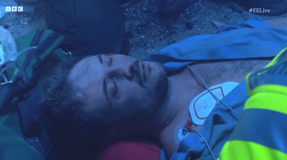 Screenshot of a man receiving CPR.