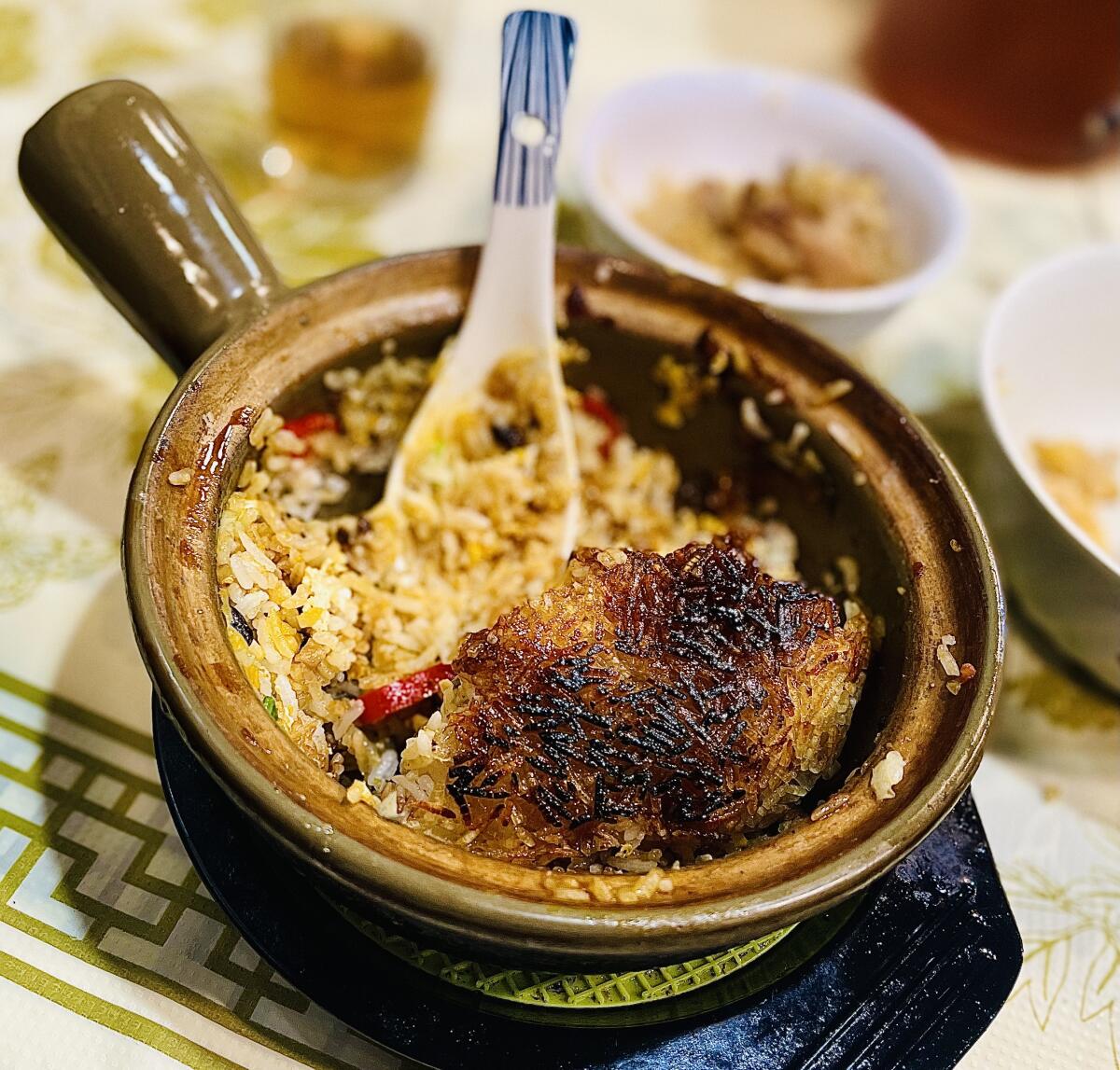 Charred crust from the bottom of the dish at Kwan Kee Claypot Rice in Hong Kong.