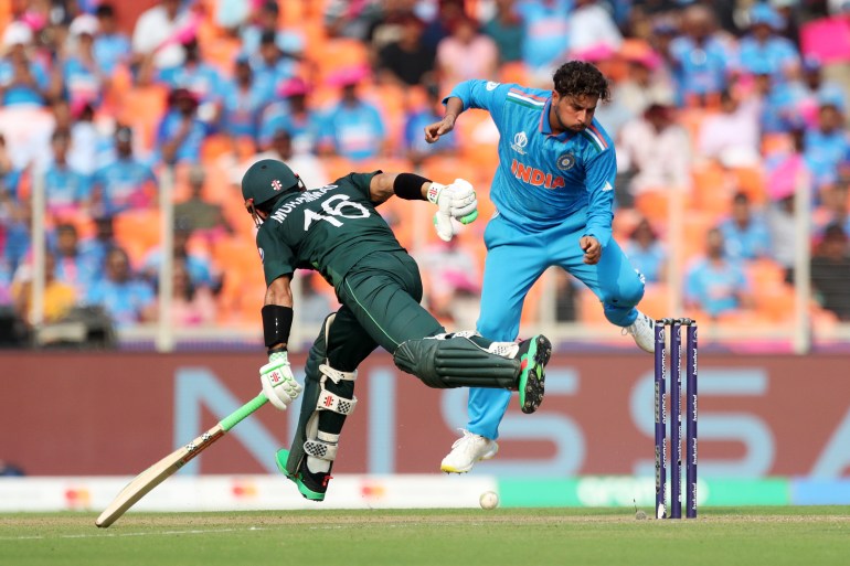 Cricket plays on field.