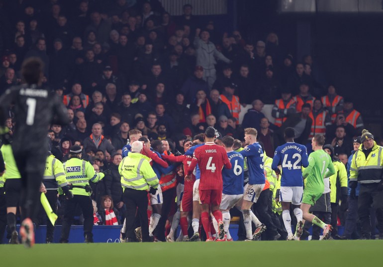 LIVERPOOL, ENGLAND - FEBRUARY 12: Tempers flare between players at the end of the Premier League match between Everton FC and Liverpool FC at Goodison Park on February 12, 2025 in Liverpool, England. (Photo by Carl Recine/Getty Images)