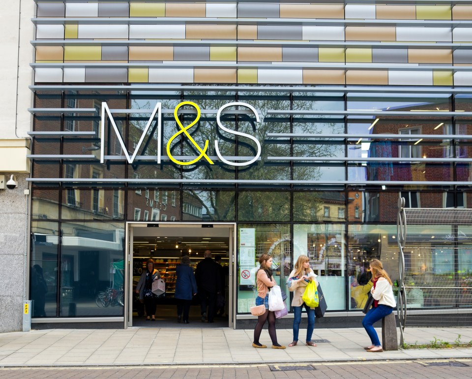 M&S store exterior with shoppers.