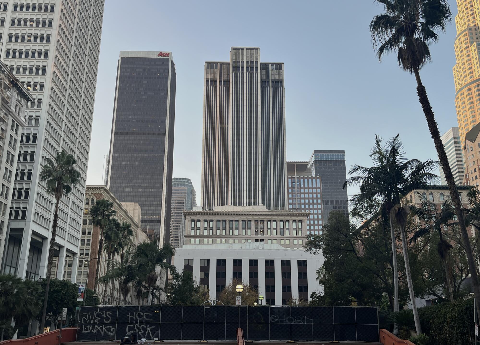 The Mutual Life Building set behind Pershing Square, an urban park in downtown Los Angeles.