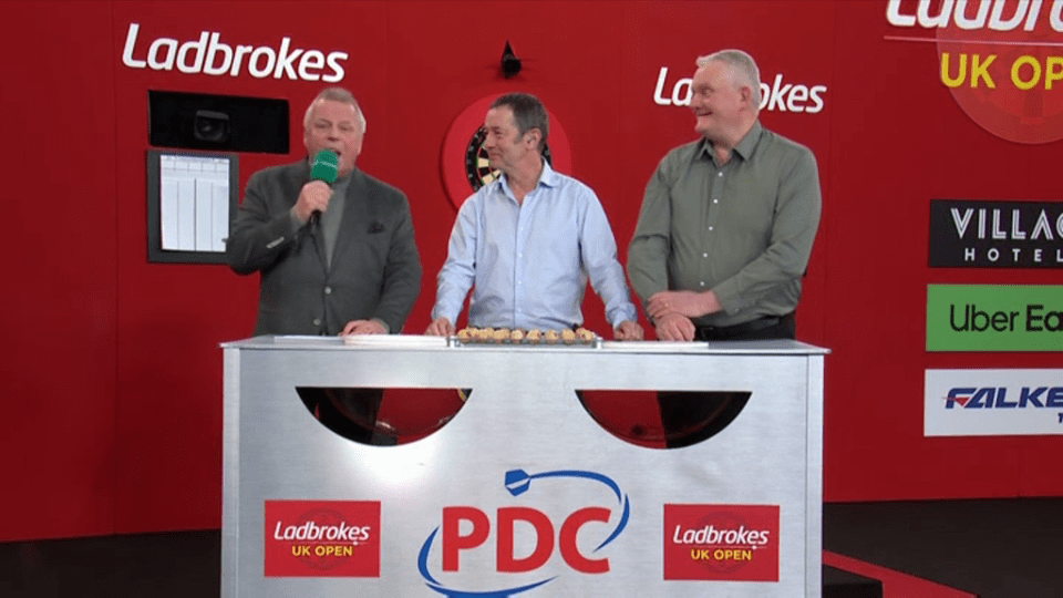 Three men at a PDC Ladbrokes UK Open event.