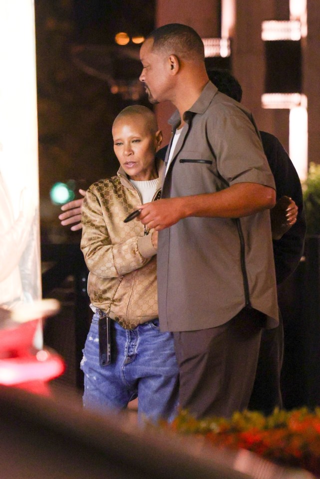 Will and Jada Pinkett Smith leaving a restaurant.