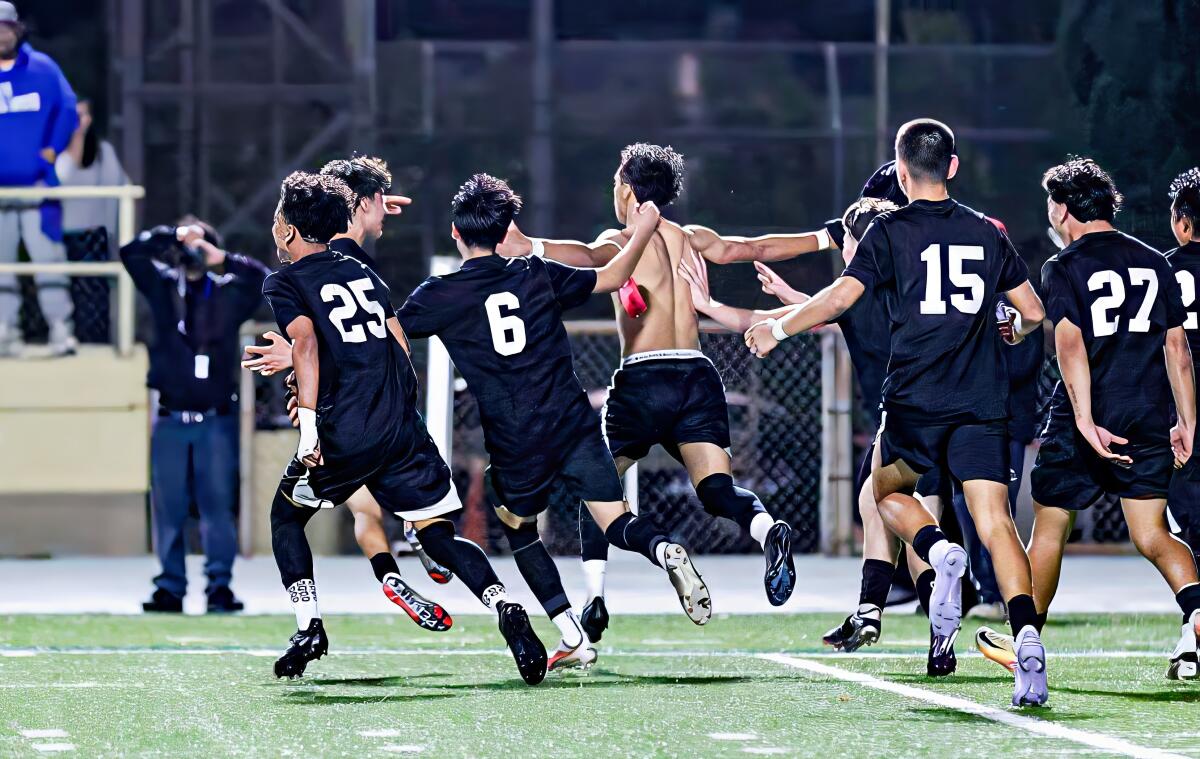 Coto Bladdimir (shirt off) celebrates with teammates after scoring the winning goal against Birmingham on Friday night.