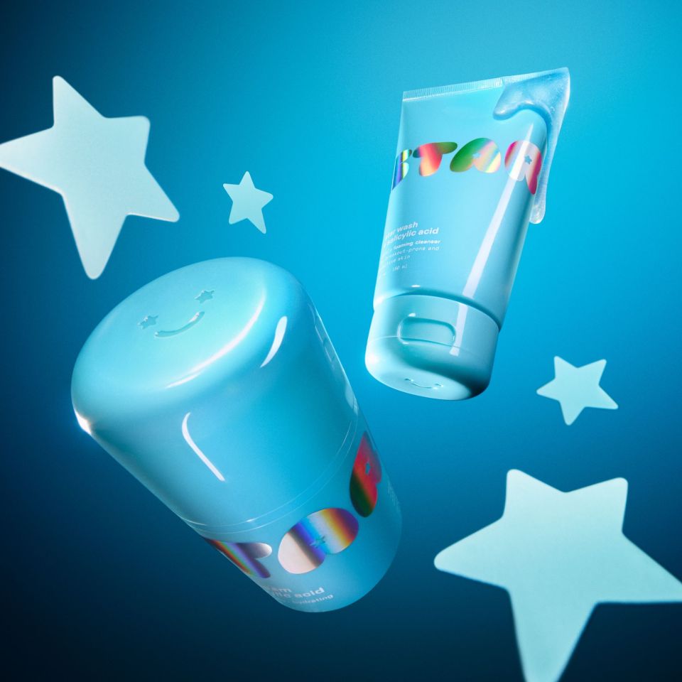 Illustration of two light blue beauty products against a blue background with stars.