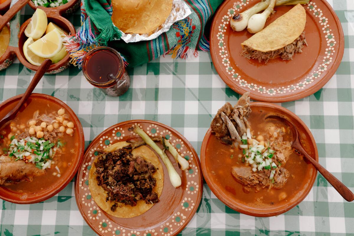 Four small dishes with cabrito en consome, goat soup with garbanzos, goat meat tacos at El Lagunero in Muscoy