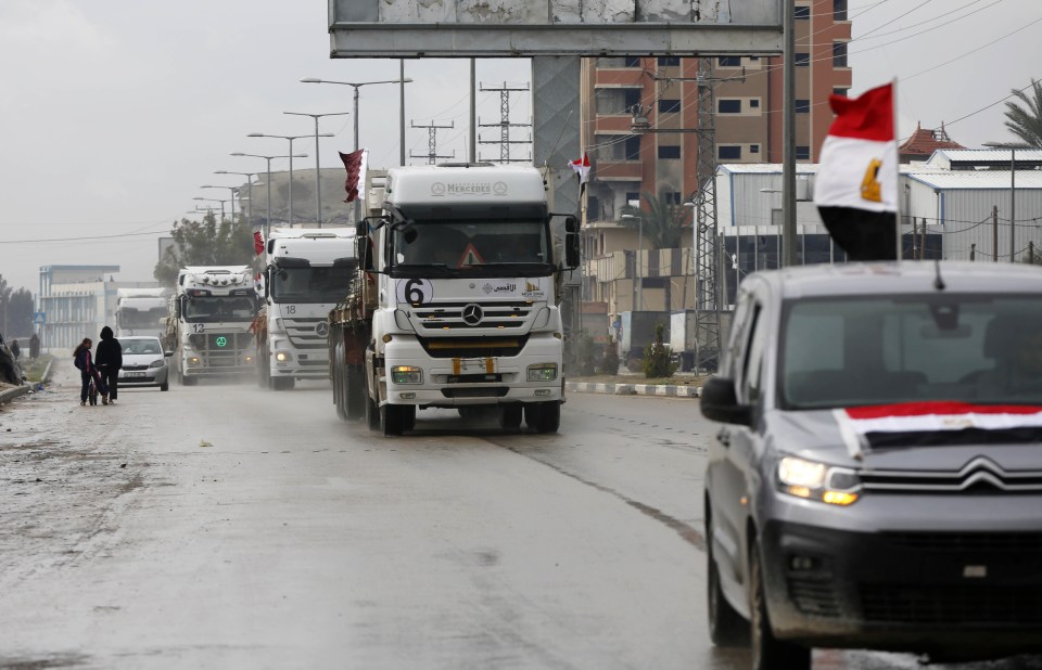 Convoy of trucks carrying aid and construction equipment into Gaza.