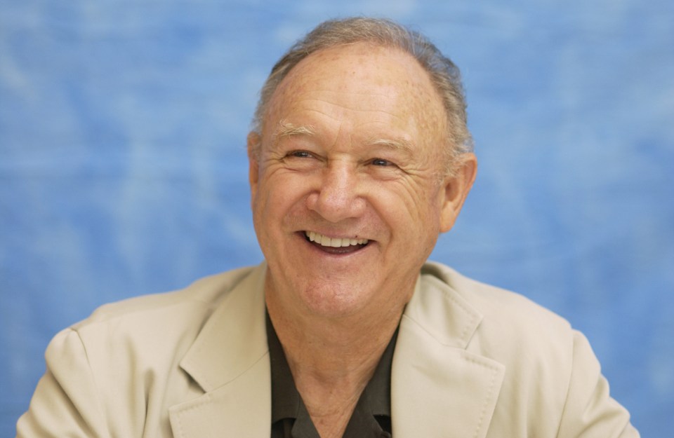 Headshot of Gene Hackman smiling.