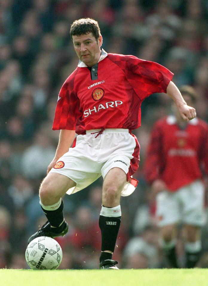 Denis Irwin of Manchester United playing soccer.