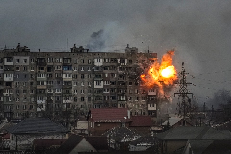 Explosion damaging an apartment building.