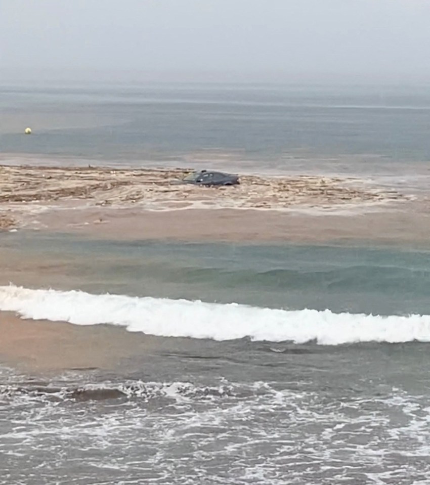 Car washed out to sea by flash floods.