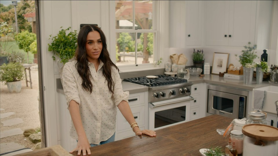 Meghan Markle in her kitchen in a scene from *With Love, Meghan*.