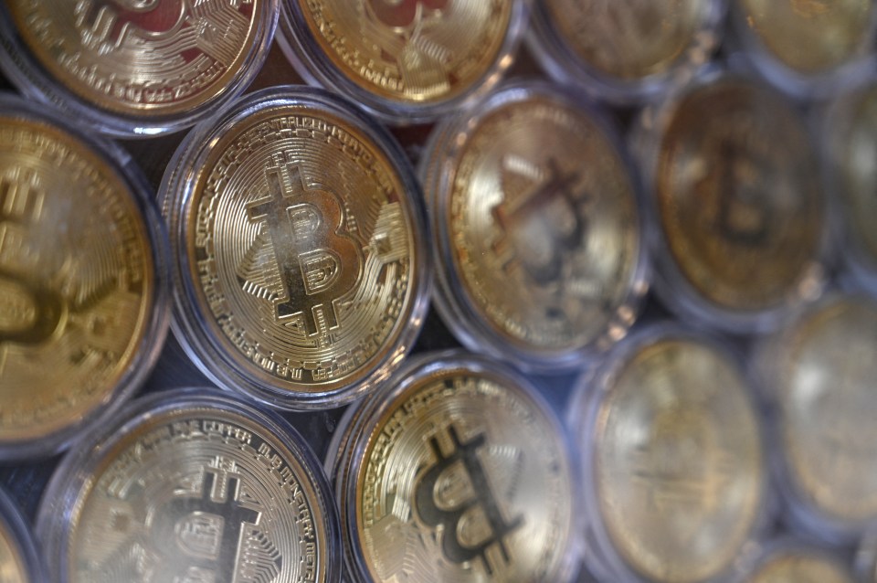 Close-up of several Bitcoin coins.