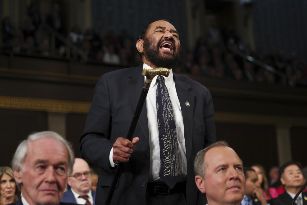 Rep. Al Green (D-Texas) shouts as President Trump addresses a joint session of Congress.