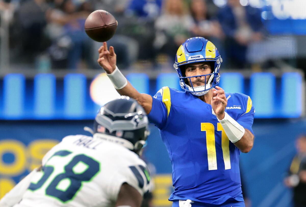 Rams quarterback Jimmy Garoppolo gets a pass off against the Seahawks at SoFi Stadium on Jan. 5.