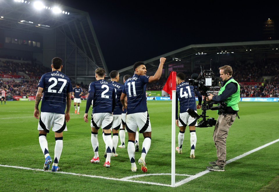 Aston Villa players celebrating a goal.