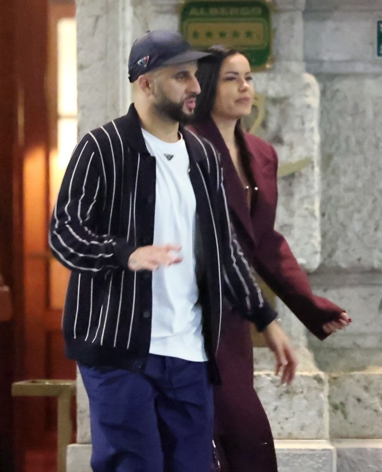 Kyle Walker leaving Casa Cipriani in Milan with two women.