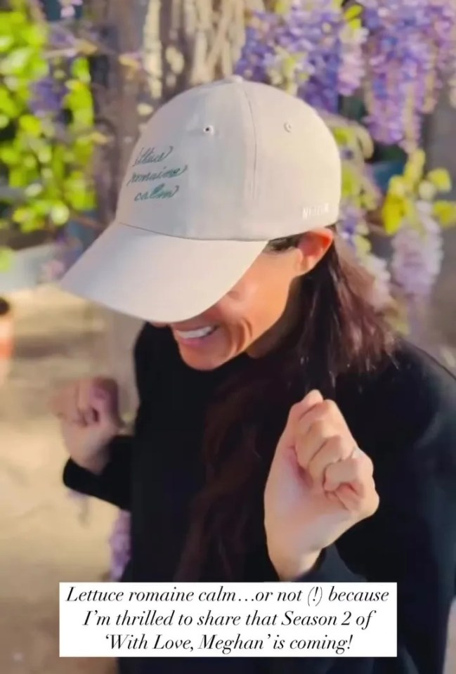 Woman wearing a beige baseball cap that says "Lettuce romaine calm" in cursive.